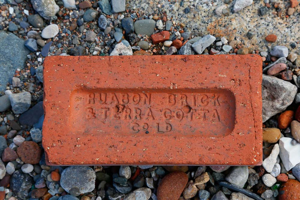 A red brick with the words Ruabon Brick & Terracotta Co LTD embossed into the surface